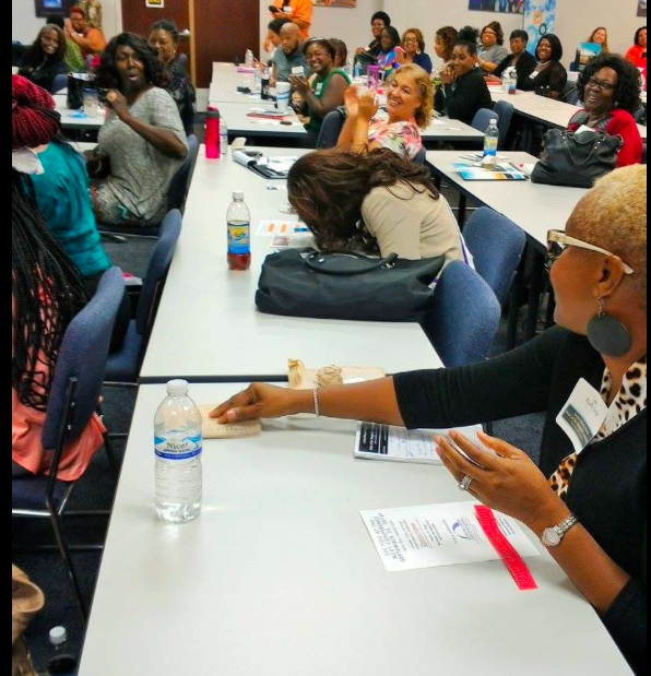 Nonprofit leaders laughing and engaged at the SONC summit